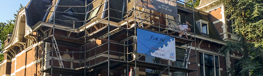 Pel Schilders aan het werk in Haarlem